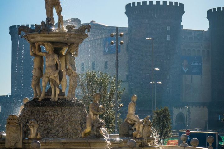 Highlights of Naples - Town Hall square fountain view with the New Castle